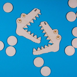 Krokodýli - symboly větší x menší